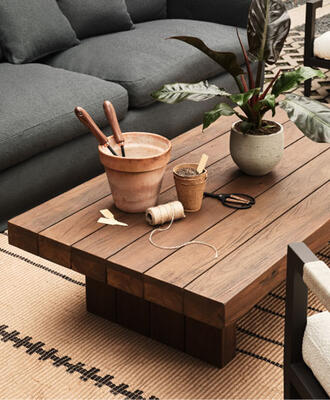 Characterized by woods from salvaged barn doors and responsibly harvested forests, Four Hands outdoor furnishings spin an eco-conscious design story worth telling. Encino outdoor coffee table made of FSC-certified reclaimed wood